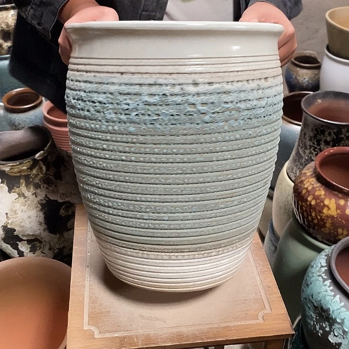 紫砂花盆口28高度33蓝气泡？……