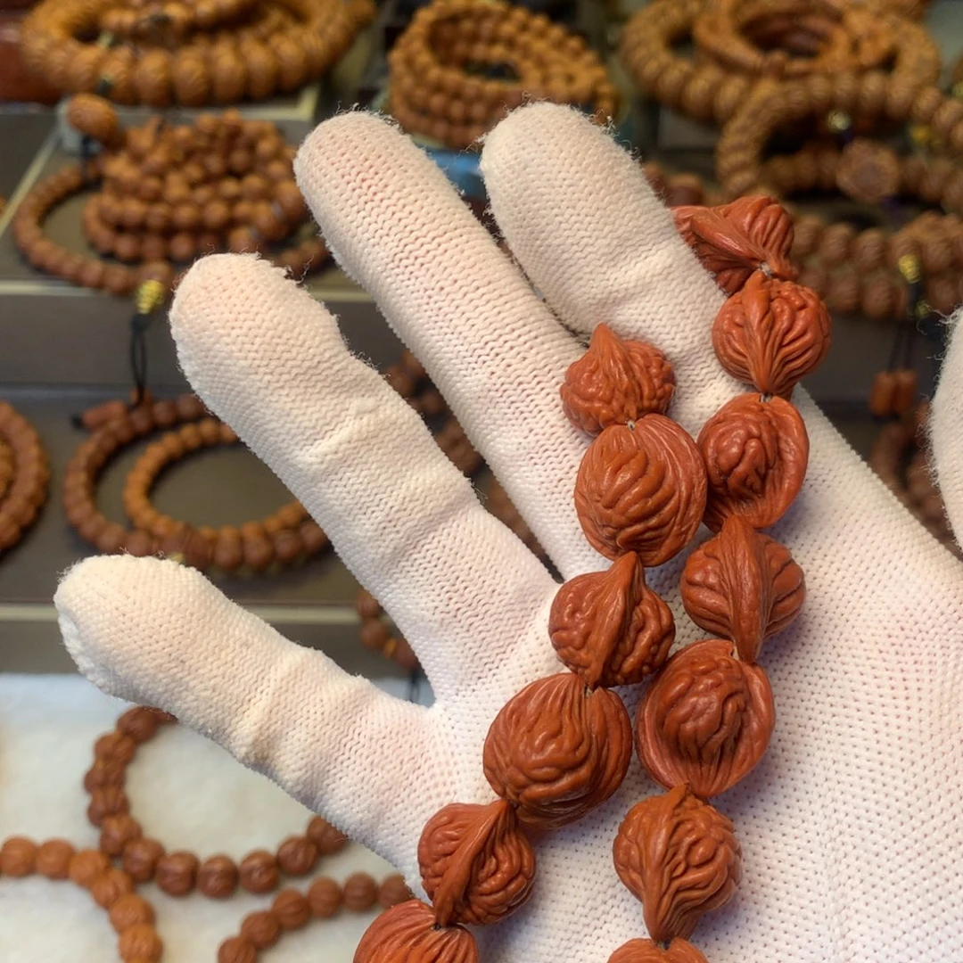 敬***1桃核手串秦岭龙纹