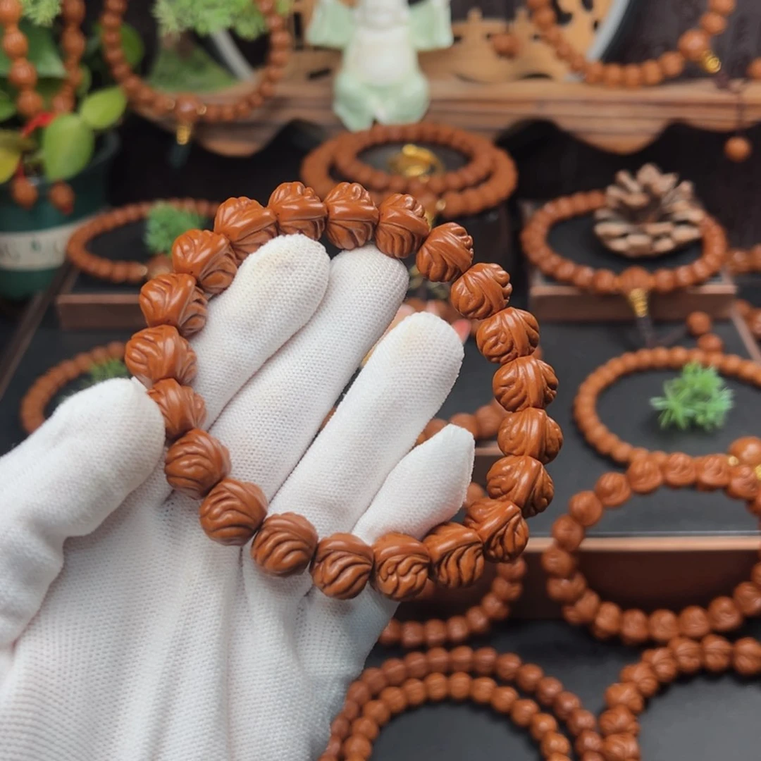 吊坠桃核。1.4顶货双脊龙手串