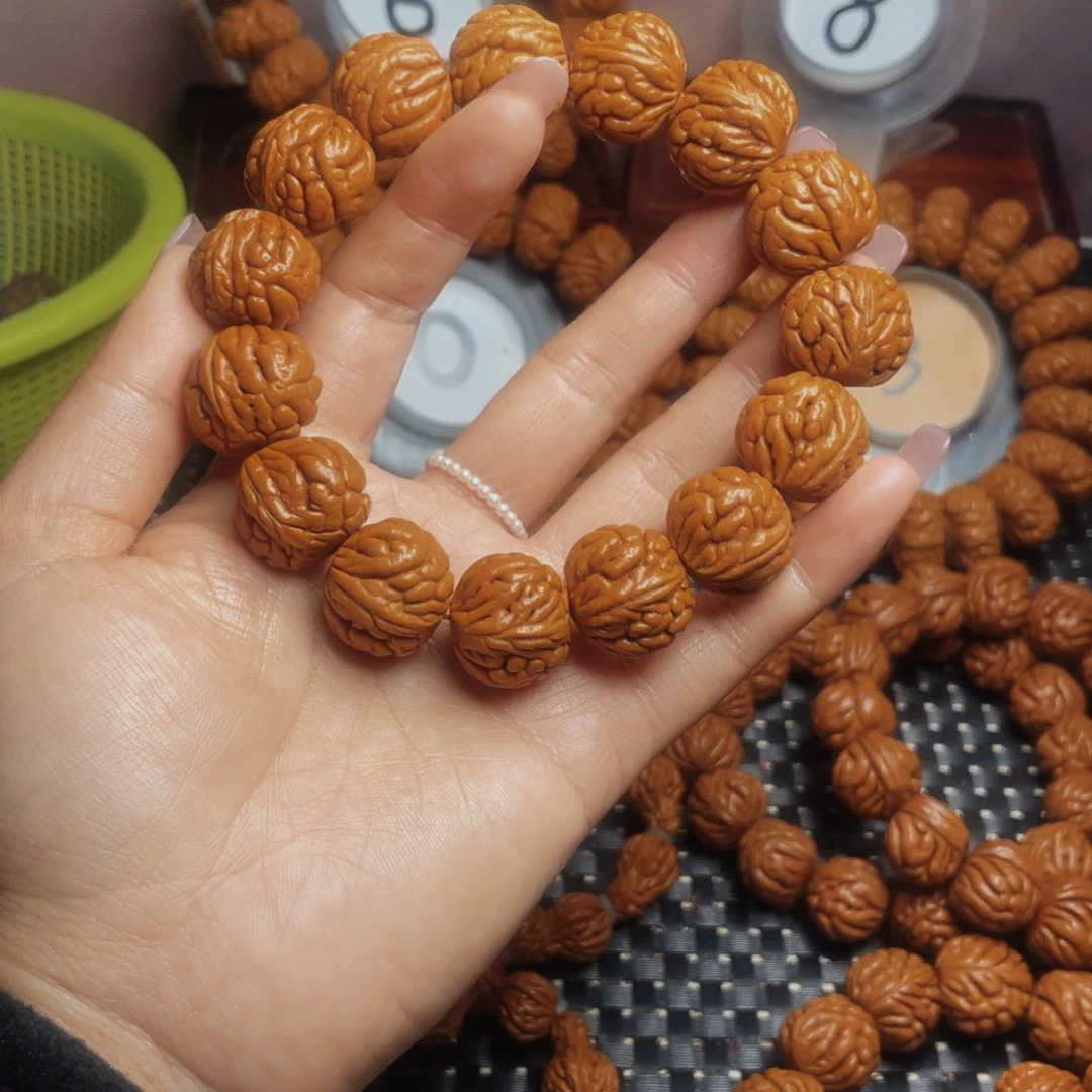 桃核手串想**乡秦岭龙纹桃核