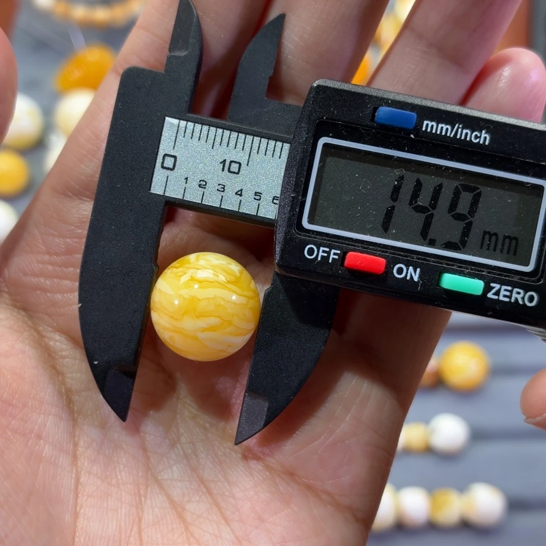 俊***名琥珀未镶嵌裸石圆珠