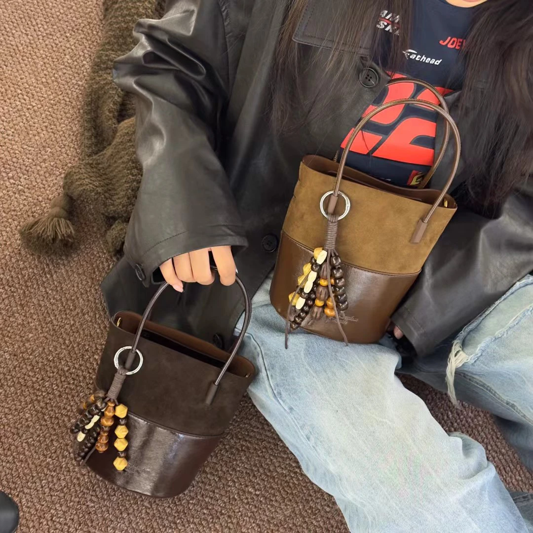 新疆包邮洋洋女包麂皮配皮小水桶【1523990】