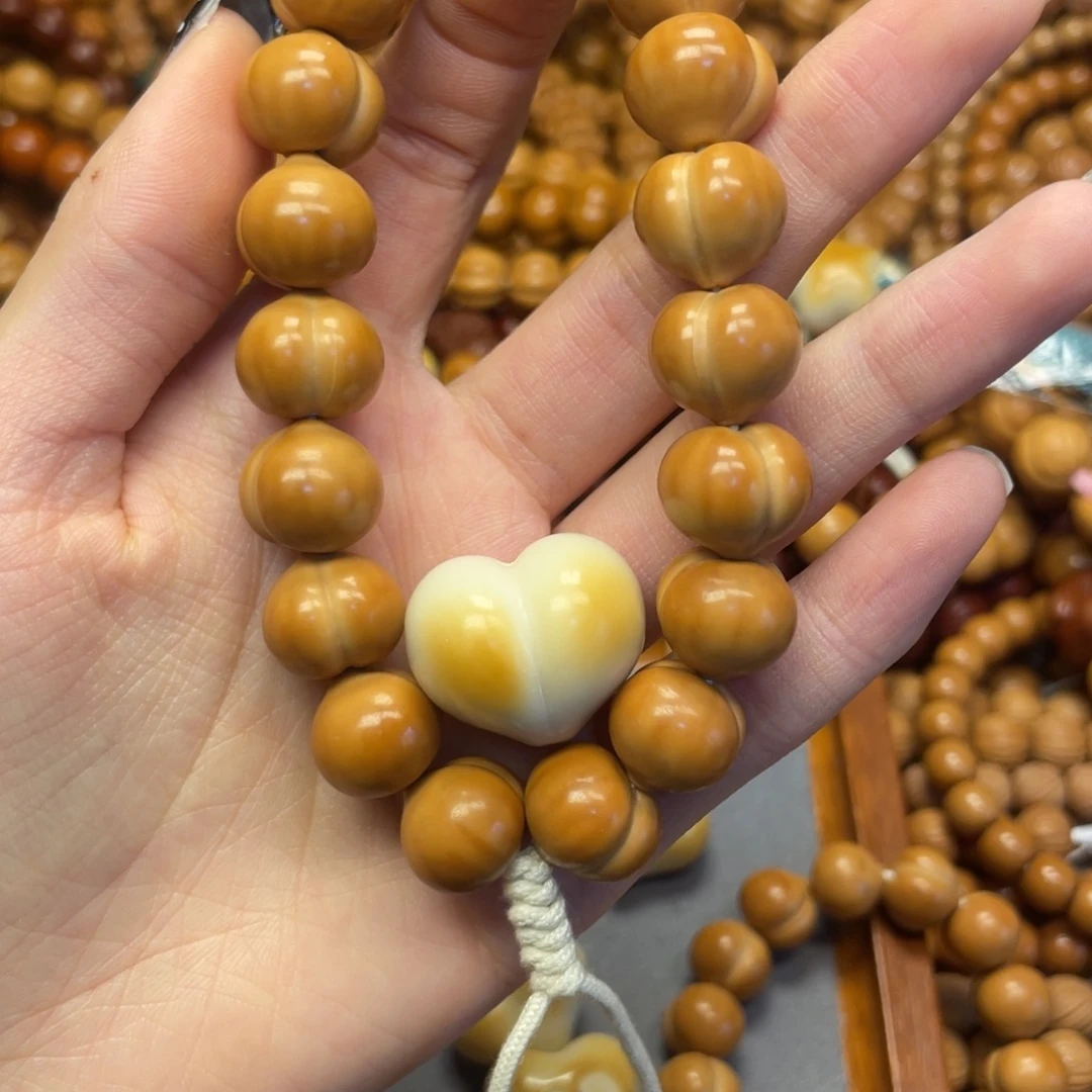 在***雨全品屁桃加爱心配饰