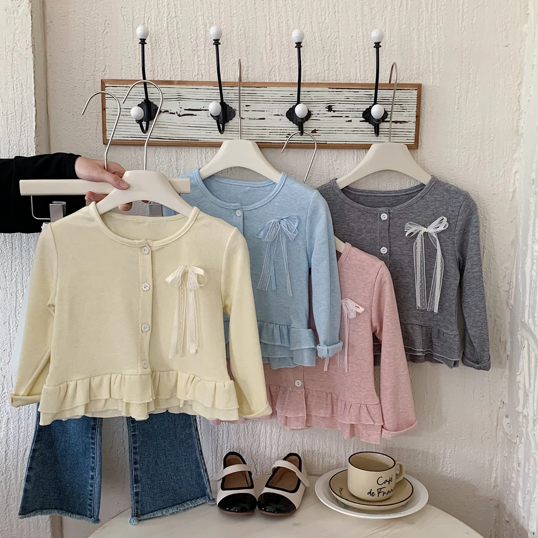 2025女宝秋款宝下摆花边设计师款时尚春秋针织开衫韩版儿童宝宝
