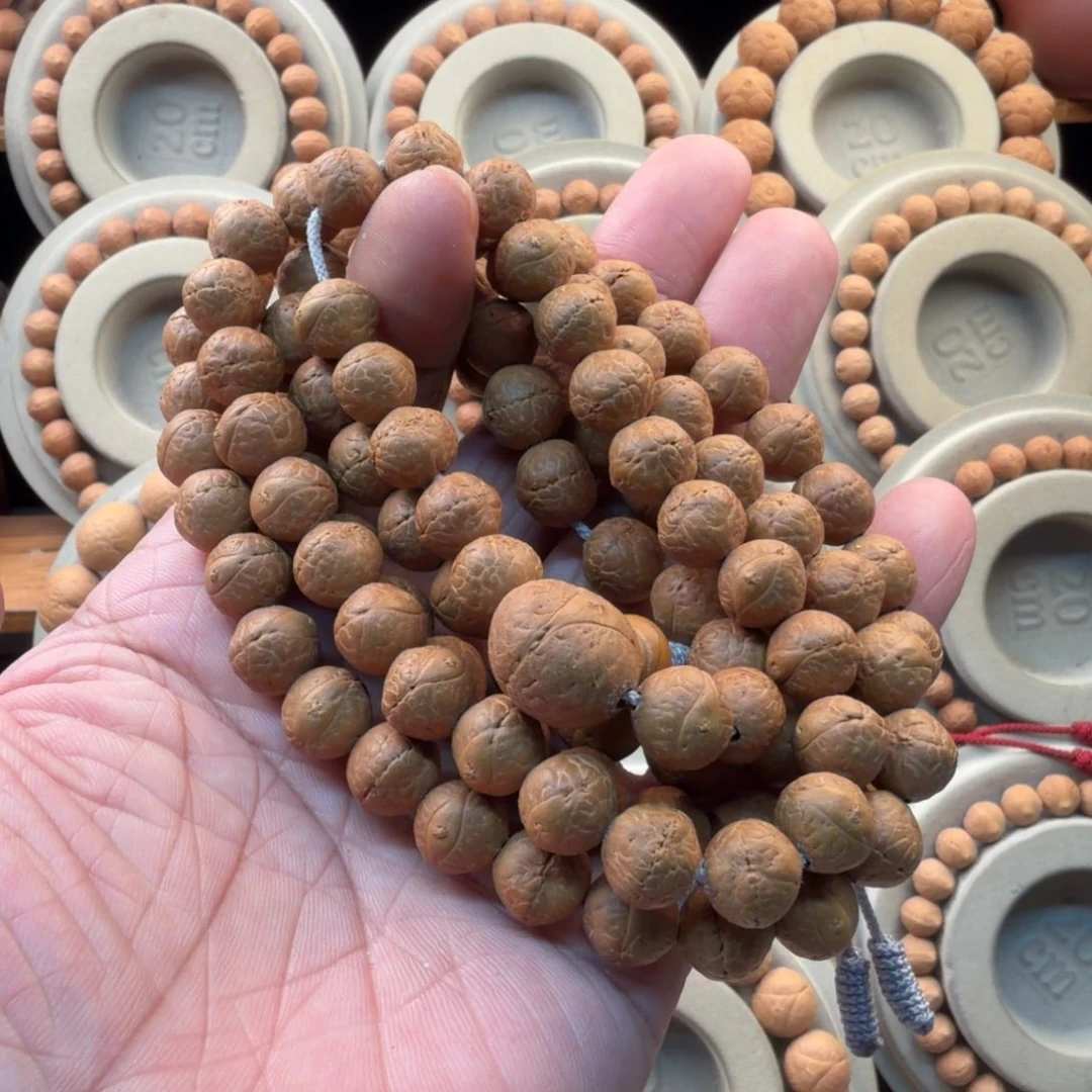 凤眼菩提手串11毫米粉红皮同树籽112颗