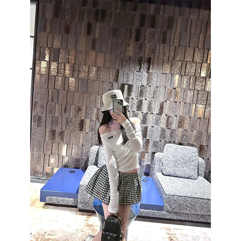 甜酷风韩系2025新款休闲高级感白色长袖一字肩上衣高腰格子半身裙