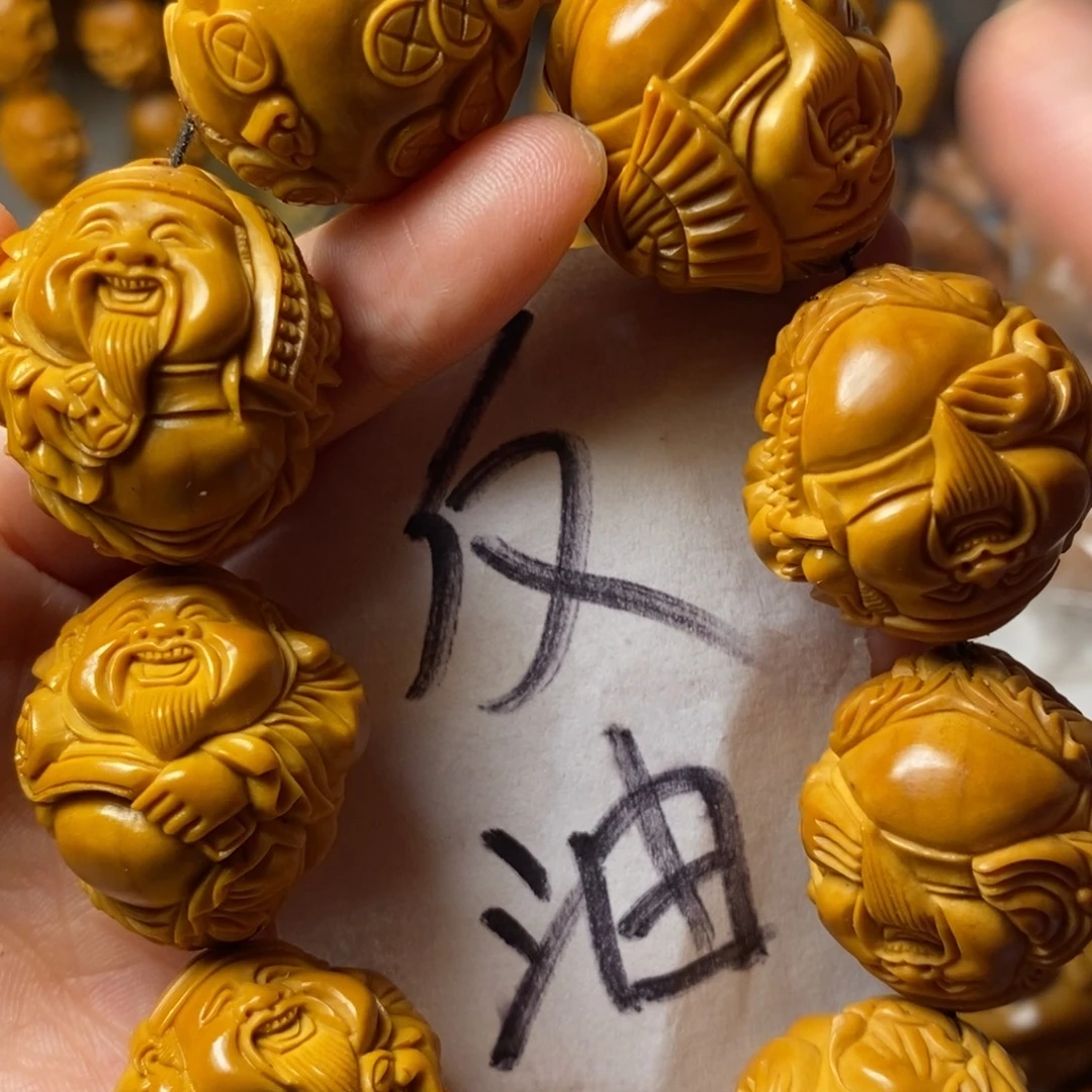 姣***海手串/手链橄榄核上色财神精品