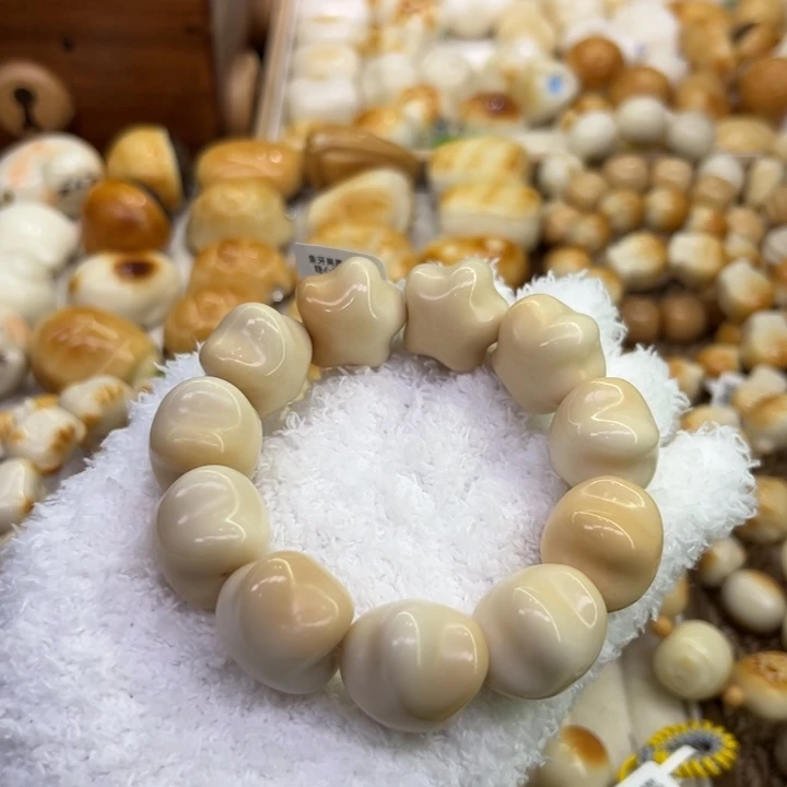 爱***咩把件菩提根/象牙果55 象牙果原果雕刻糖心胖星星卡26微瑕