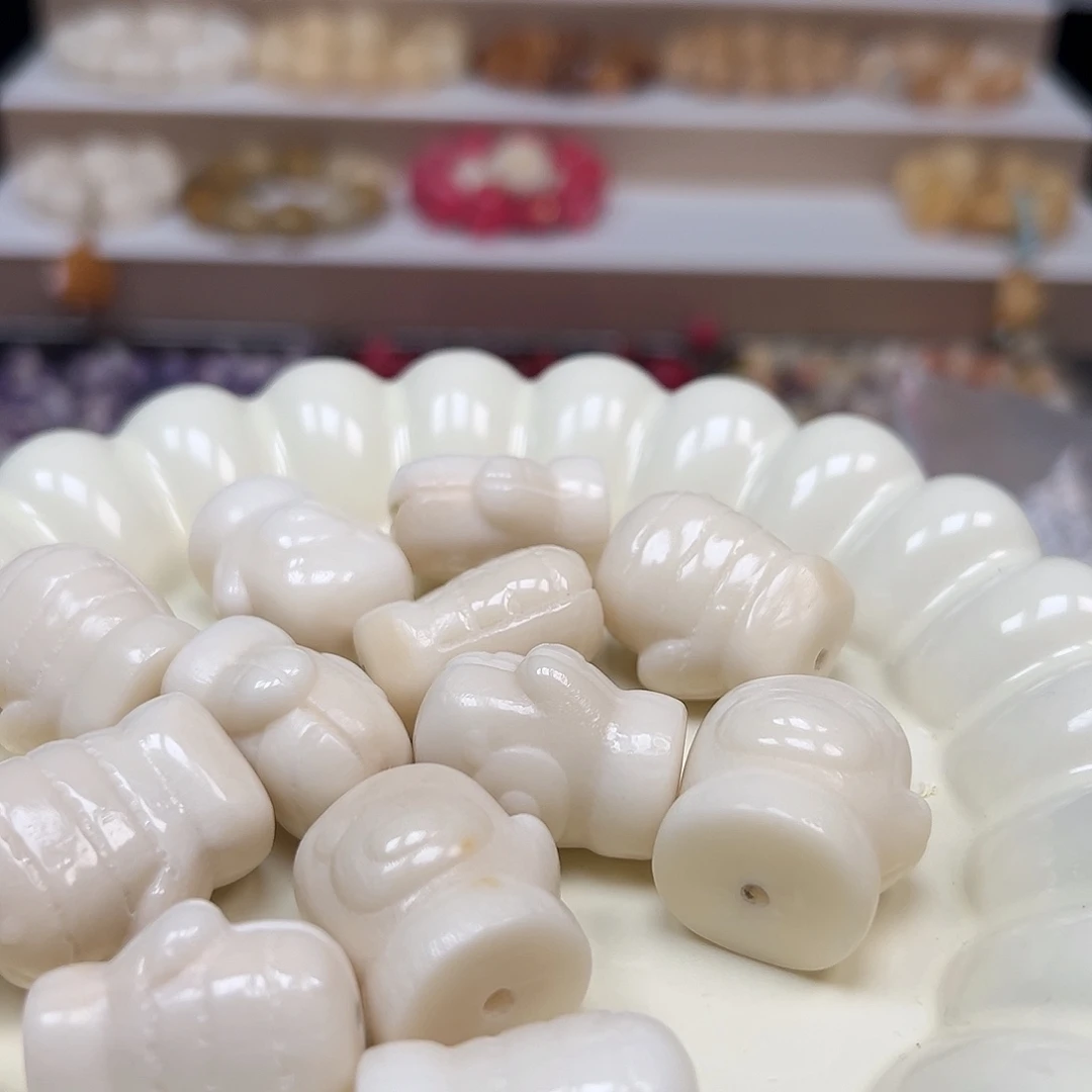 手串菩提根/象牙果微瑕白色小熊手套12颗有裂