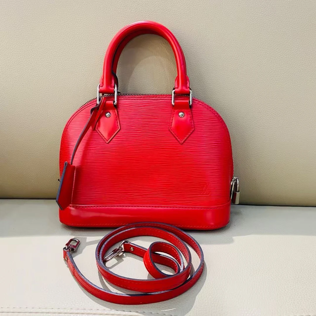 95新 LouisVuitton/路易威登 LV 红色水波纹贝壳单肩包 32819