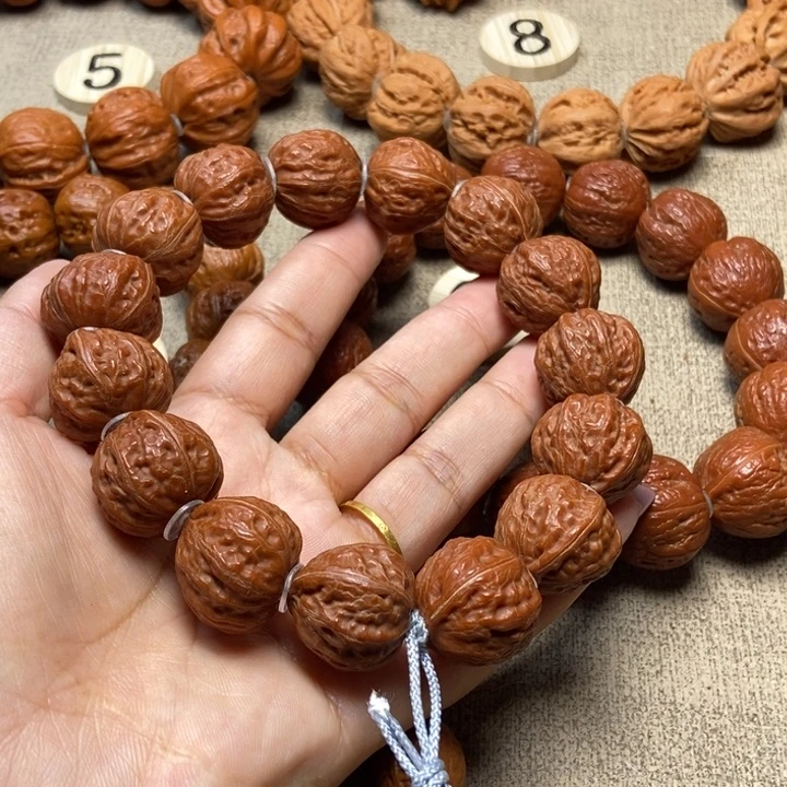 文玩核桃吊坠有*哥八棱手串