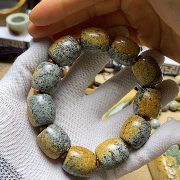 岫岩河磨玉（透闪石质玉）手把未镶嵌恭****袋