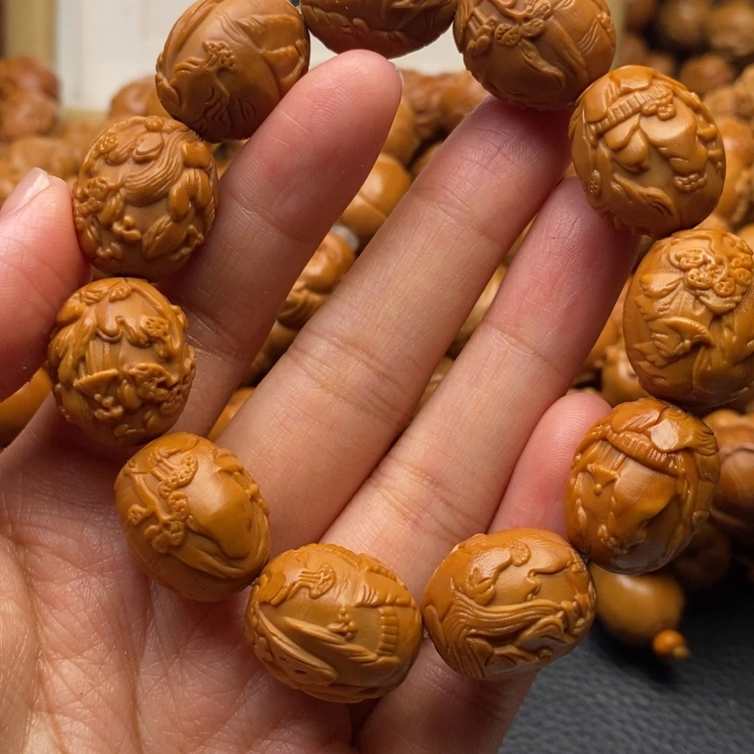 手串橄榄核鸽子蛋山水