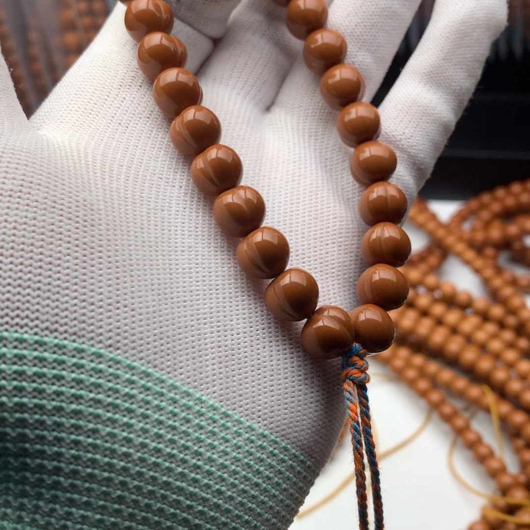 梅***客猴头核桃手串屁桃