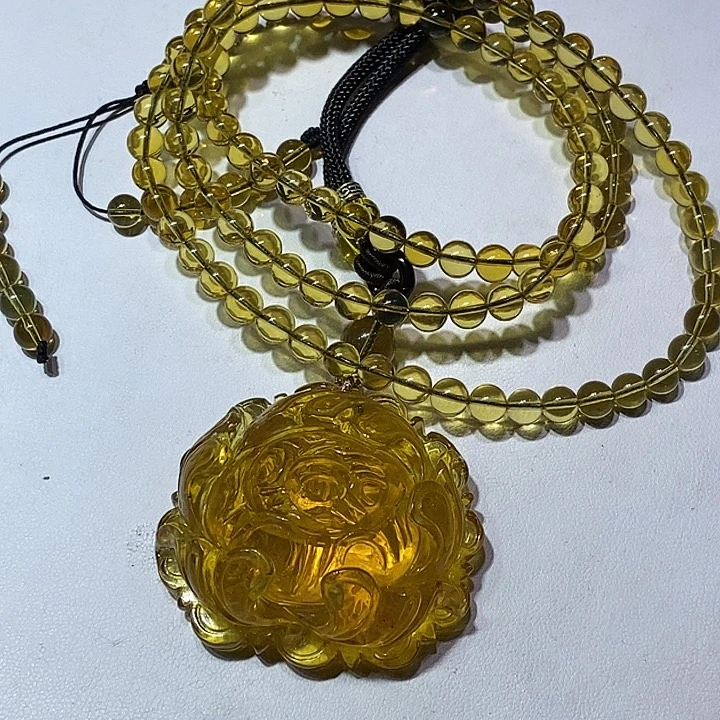 未镶嵌颈饰琥珀可****?牡丹花27克，6+的108
