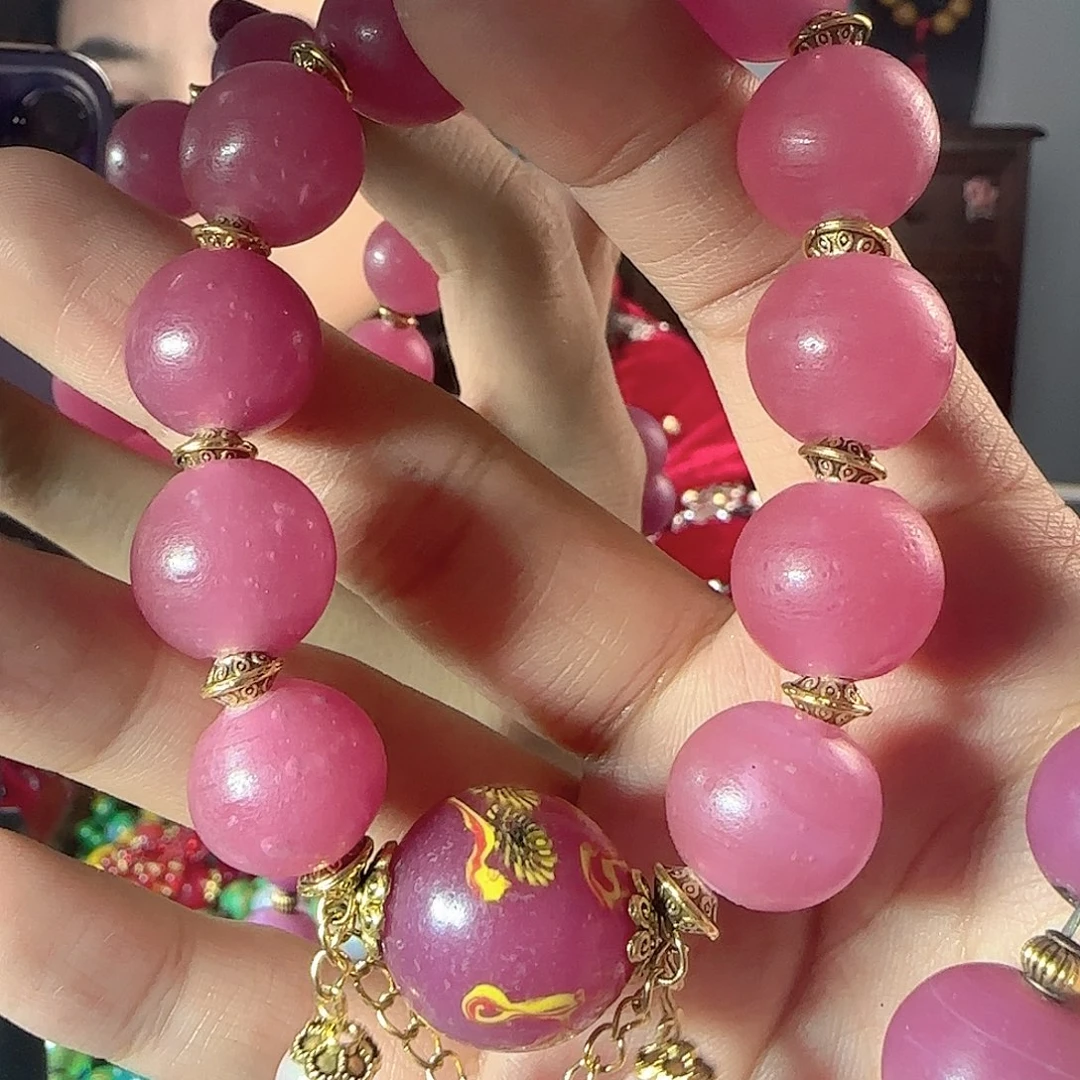 玻璃颈饰老琉璃的故事是一个人的故事吧笑