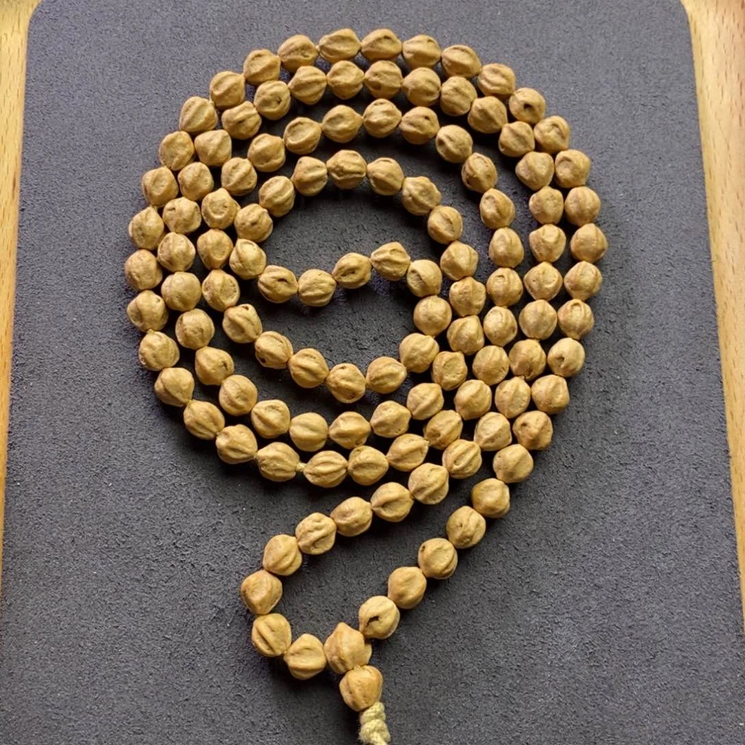 莫***莫柏香籽/百香籽吊坠