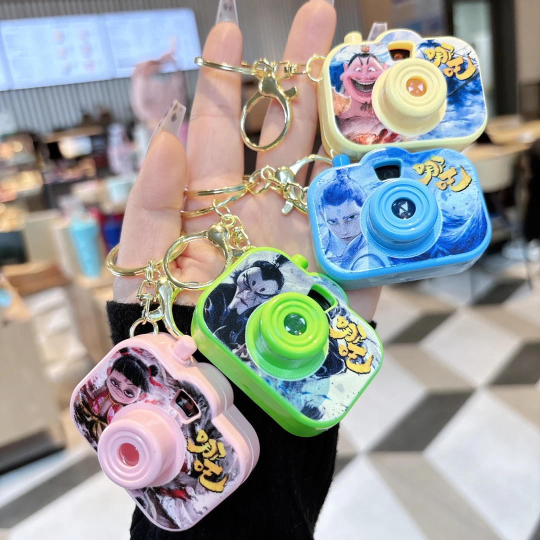 新款哪吒相机儿童钥匙扣迷你投影解压书包挂件小礼品小饰品