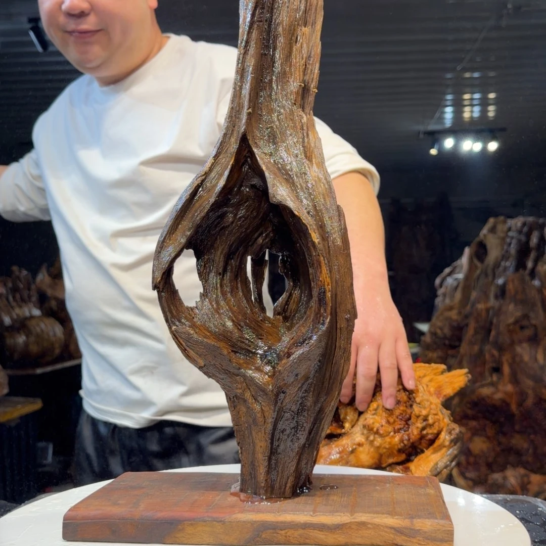 杨***忆木王一刀琥珀木摆件66