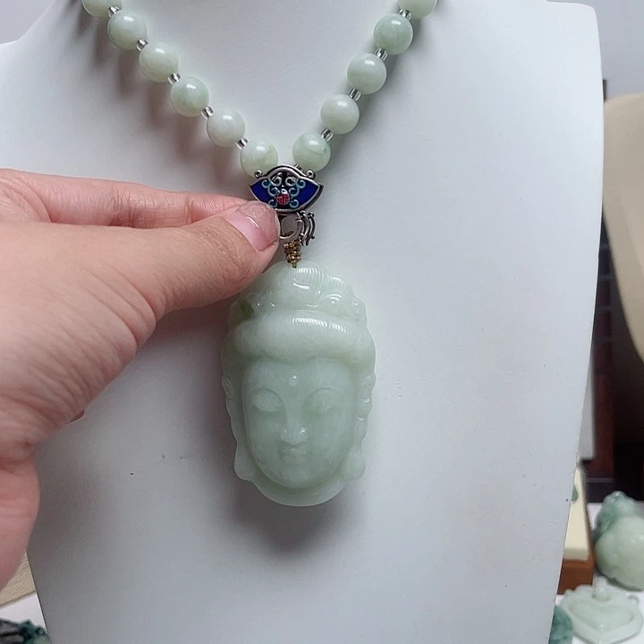 透闪石-蛇纹石玉未镶嵌颈饰雁****?