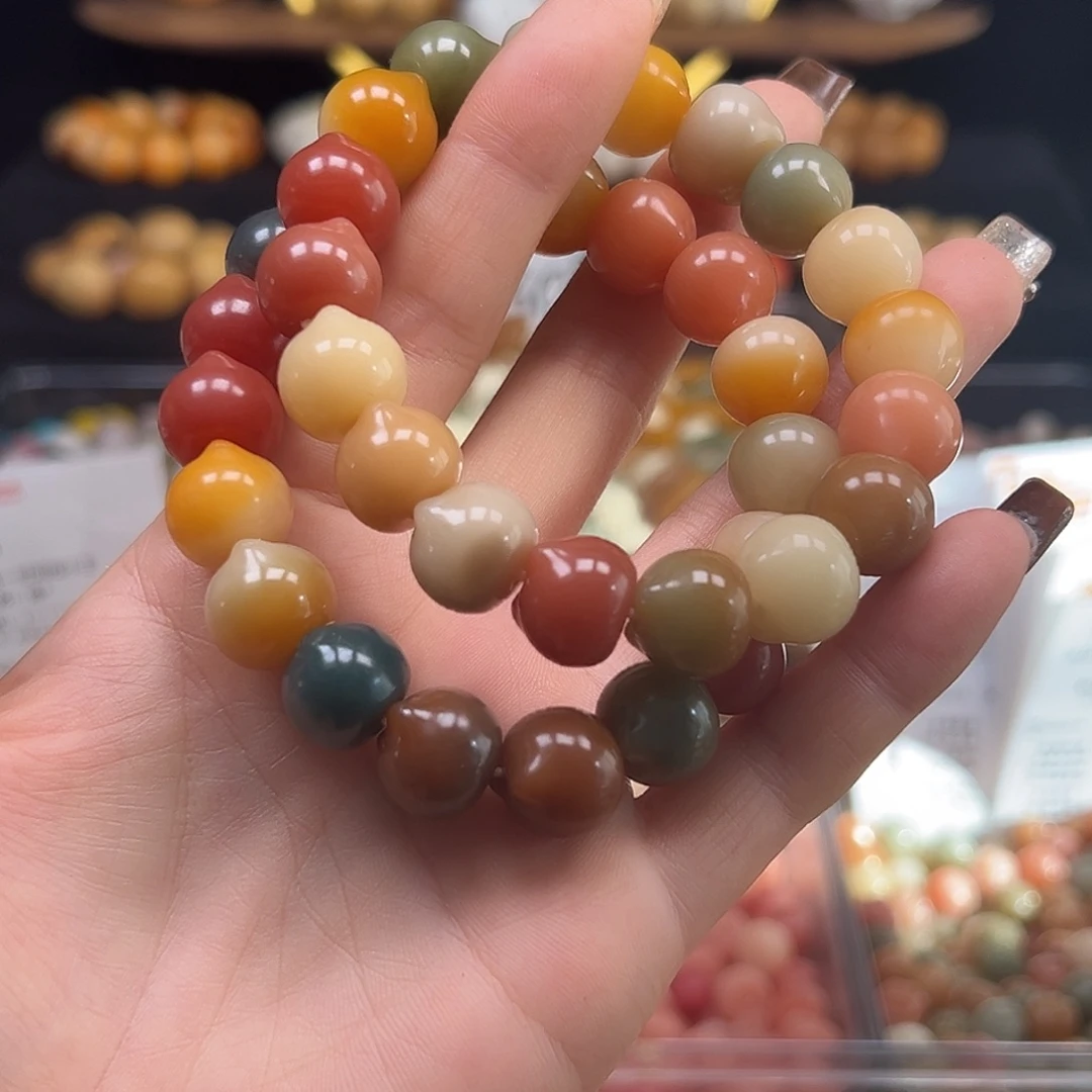 手串菩提根/象牙果卡1玉化多宝猫头1条