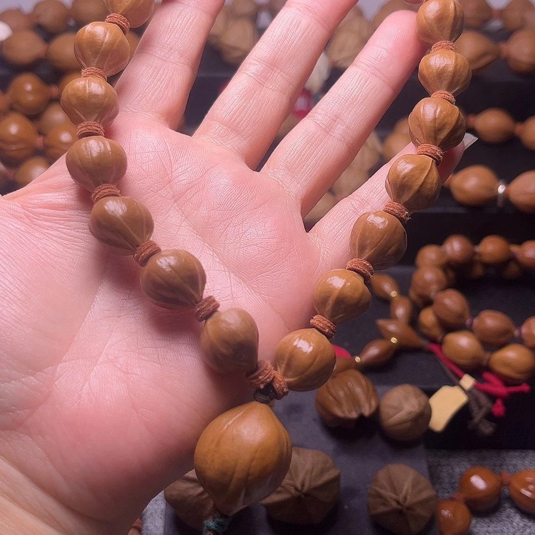 橄榄核吊坠梅林蜜桃臀手持14.14