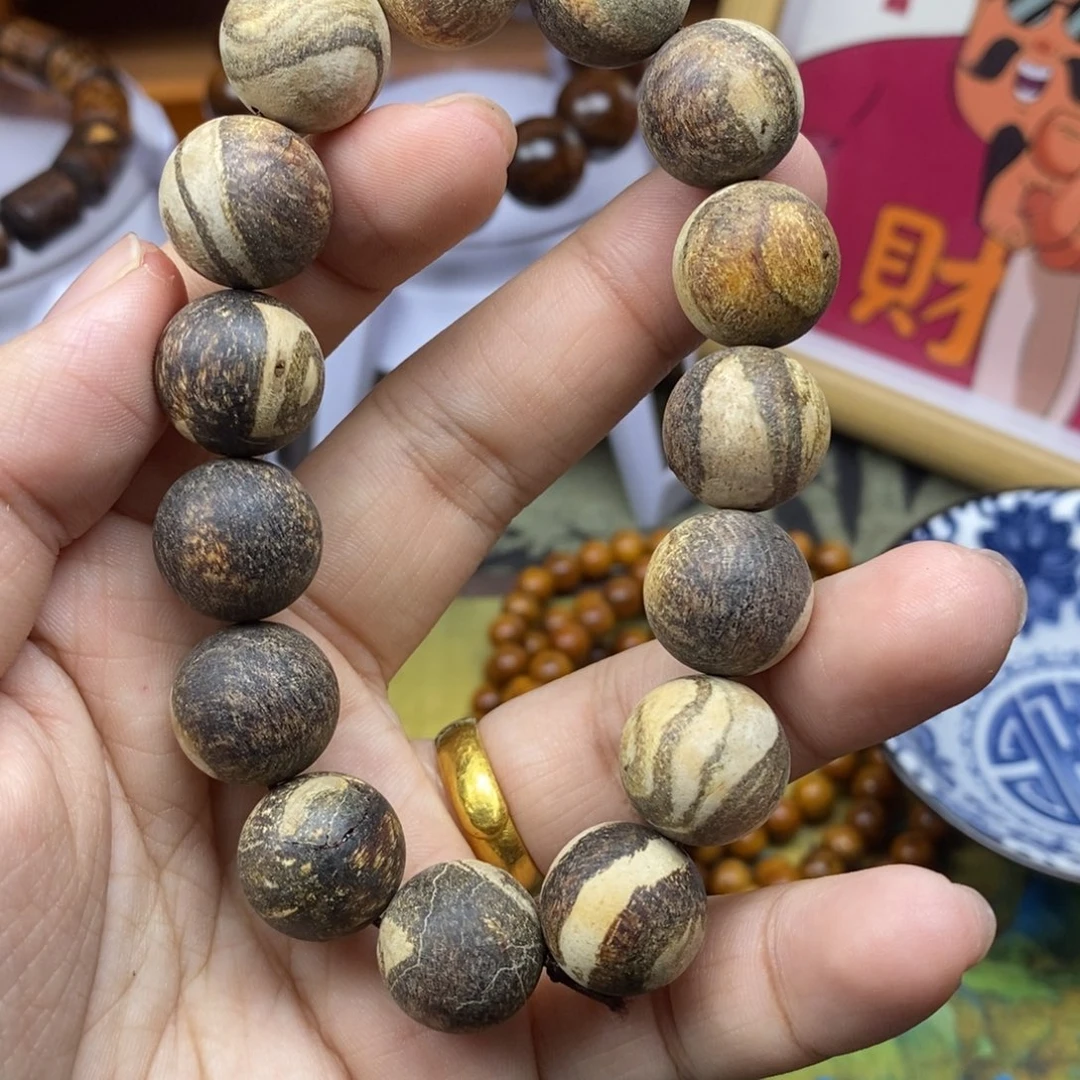 贡木秋***实贡木1.5微瑕手串手链