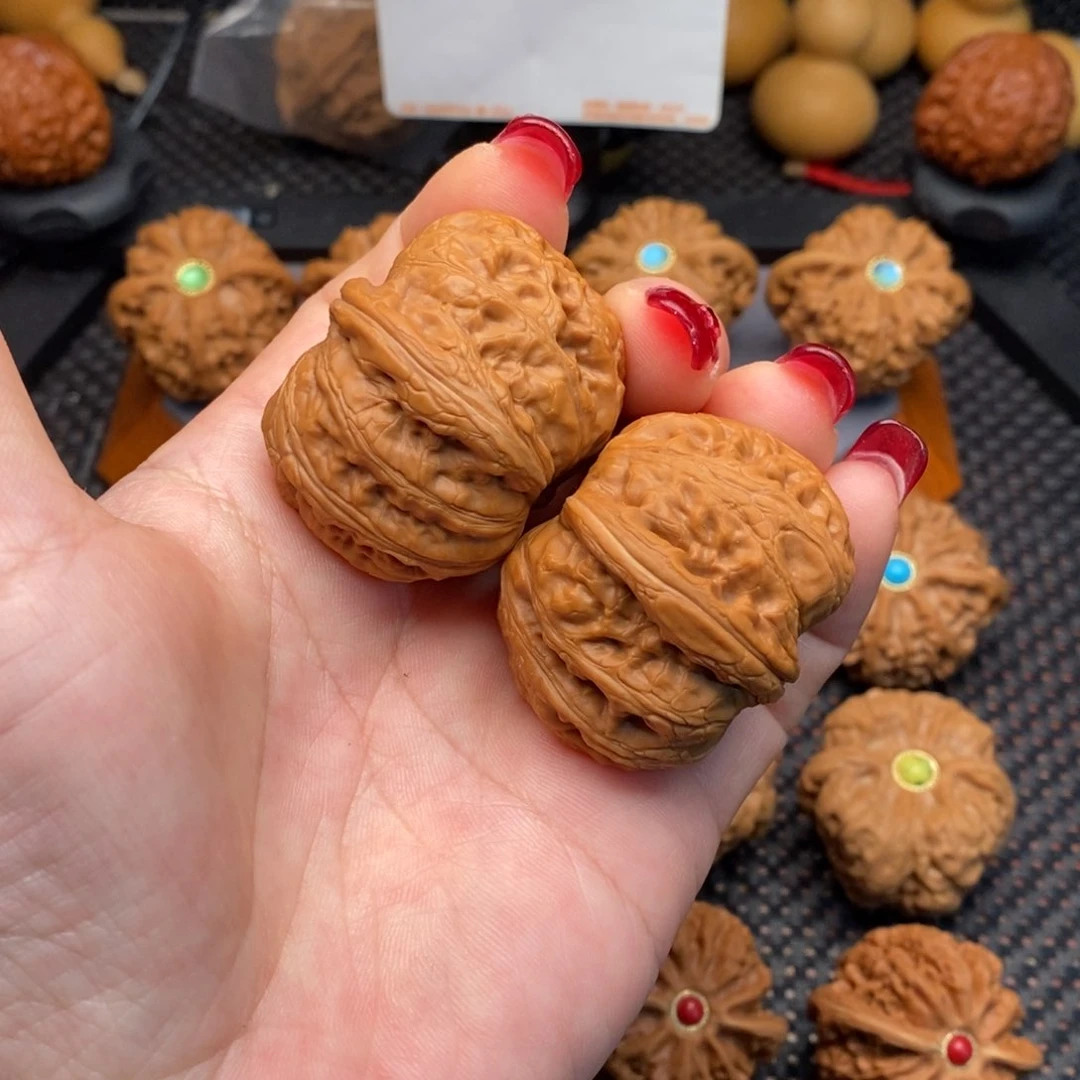 文玩核桃把件书****.元宝