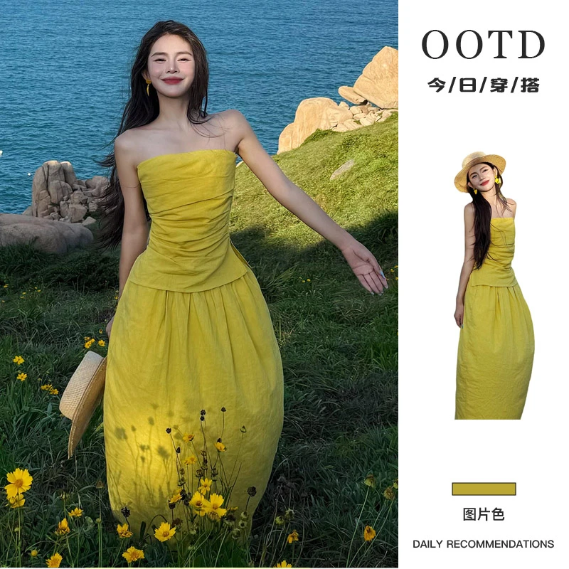 黄色一字肩抹胸连衣裙子女夏季2025新款海边度假法式气质绝美长裙