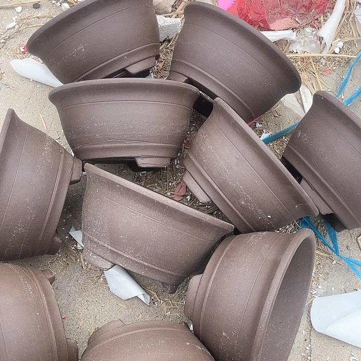 紫砂花盆   100,-10。  19.5-10