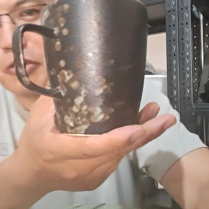 泗水砭石文化馆麒麟老虎石手把杯