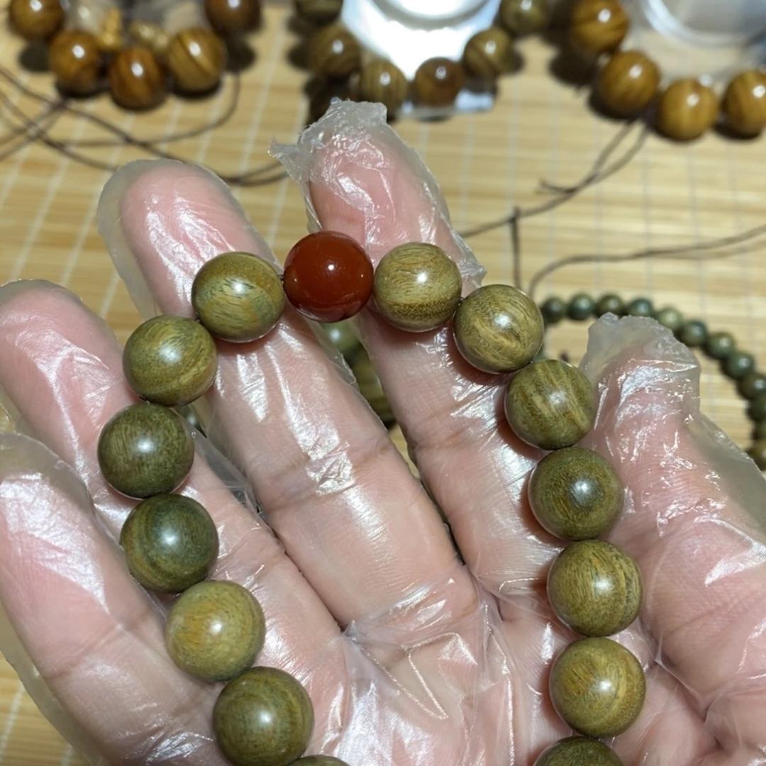 金丝楠心***绿檀1.2手串花纹