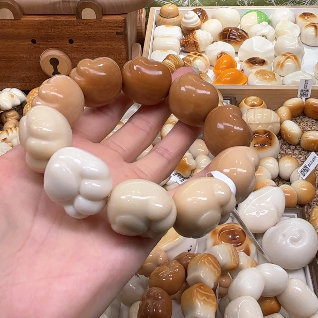 菩提根/象牙果手串9.27.44象牙果渐变熊掌瑕