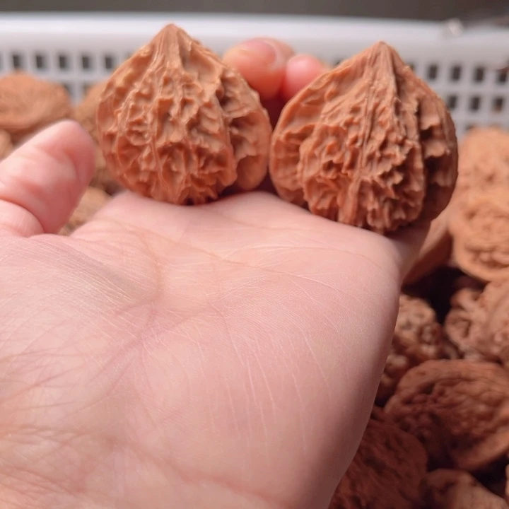 童***）文玩核桃吊坠三愣一对