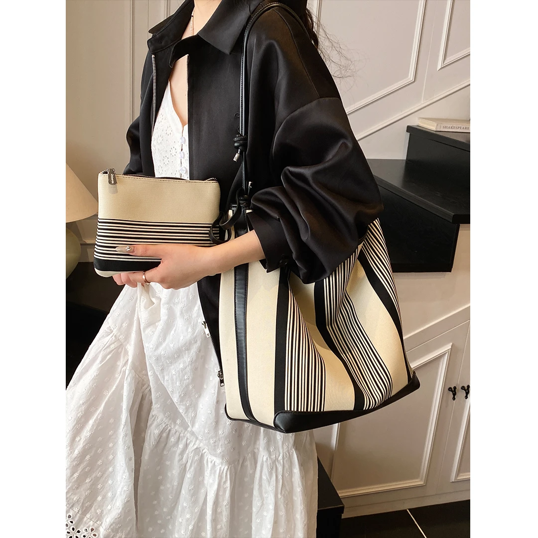 大容量单肩小众设计水桶包托特包条纹女撞色托特包腋下通勤包大包