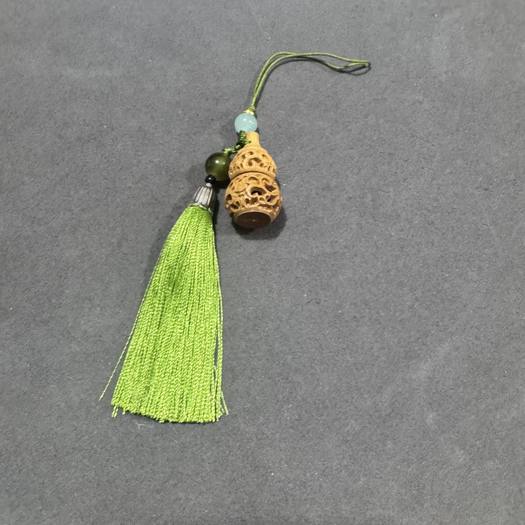 2622-檀木玲珑镂空葫芦吊坠一个19*34mm