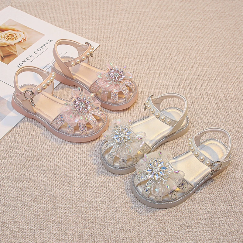 儿童凉鞋夏季新款女童防滑珍珠水钻公主鞋中大童蝴蝶包头沙滩鞋