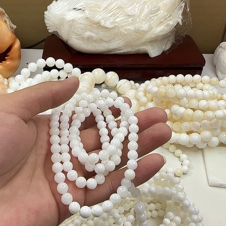 棋***姐大果紫檀（缅甸花梨）半玉化0.6脖挂两条