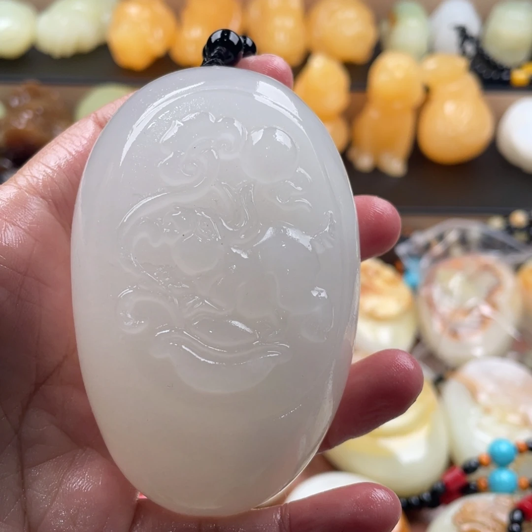 往***照石材古青石手把件