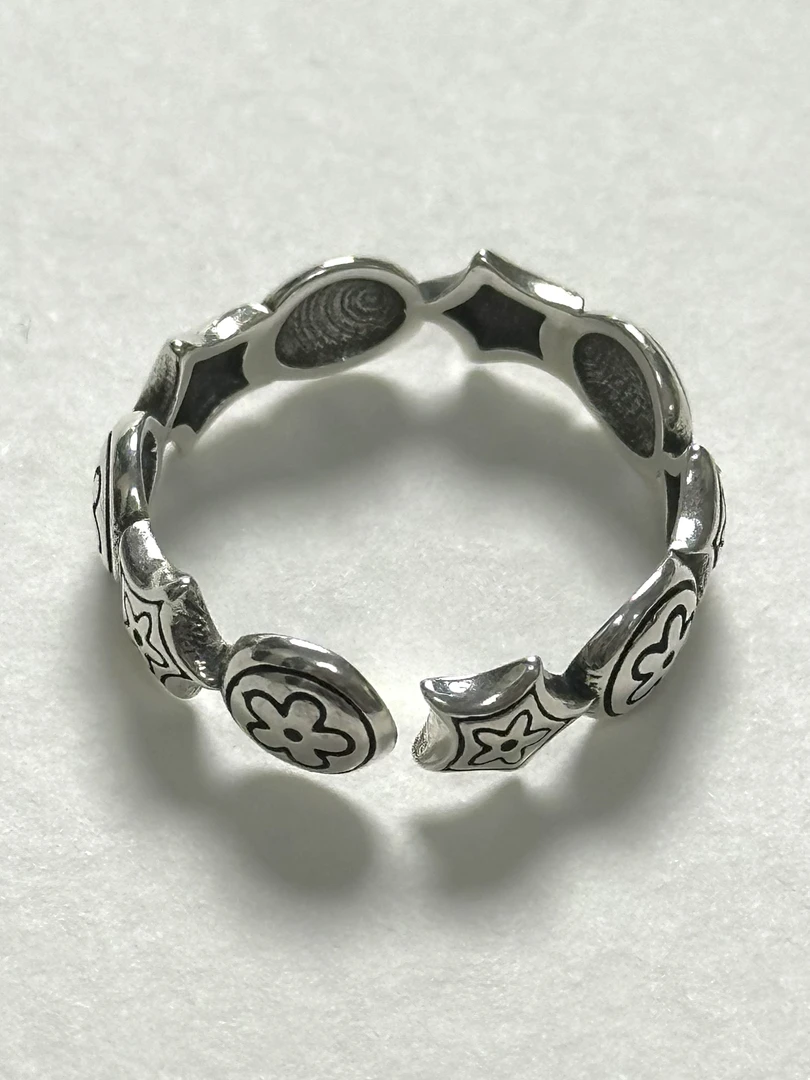 925银戒指 旋转小花环绕925纯银戒指