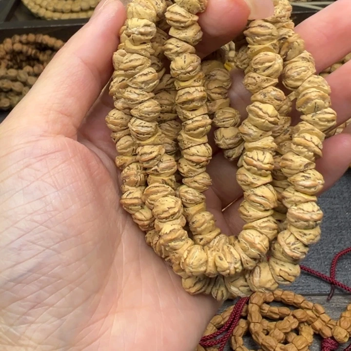 颖***宝柏香籽/百香籽吊坠