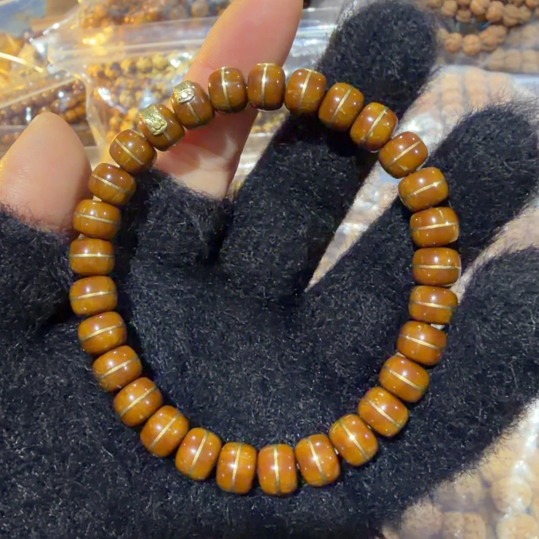 白***森猴头核桃吊坠实心紫金鼠手串