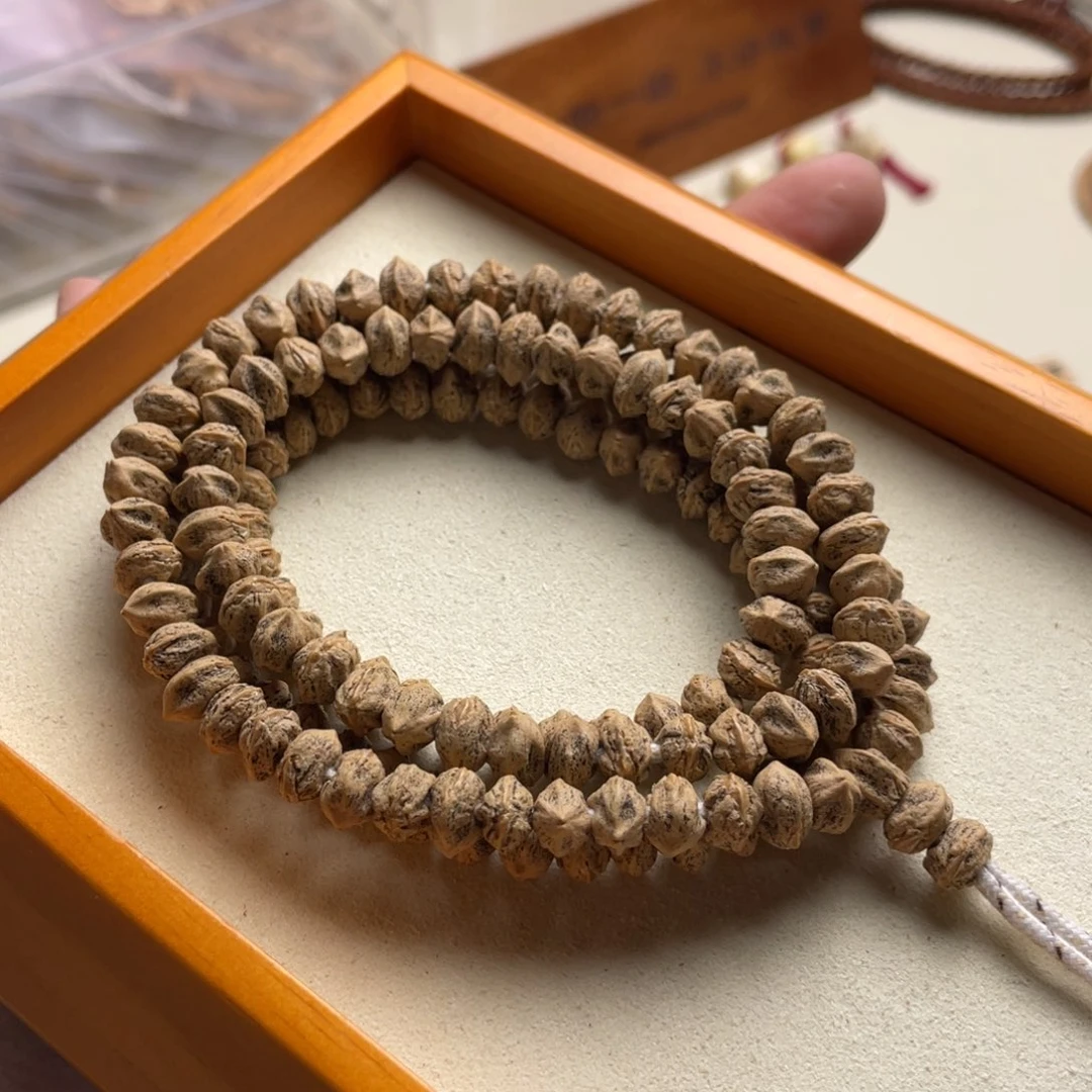 柏香籽/百香籽吊坠红芽横打原桩