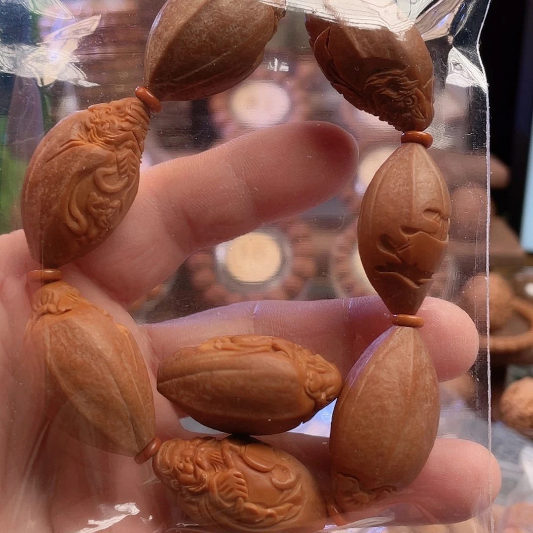 和***川橄榄核手串包衣钟馗