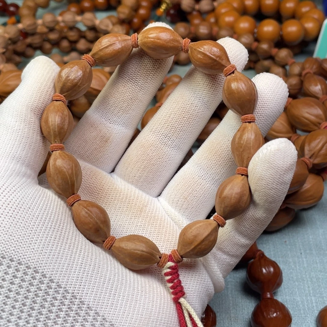 昌***哥橄榄核手串/手链13水晶核直心料三面佛