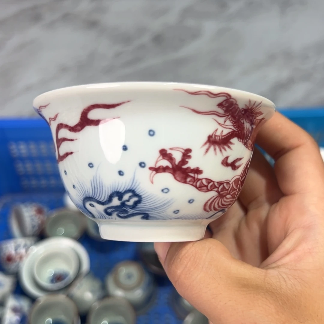 白青花釉里红鱼化龙压手杯