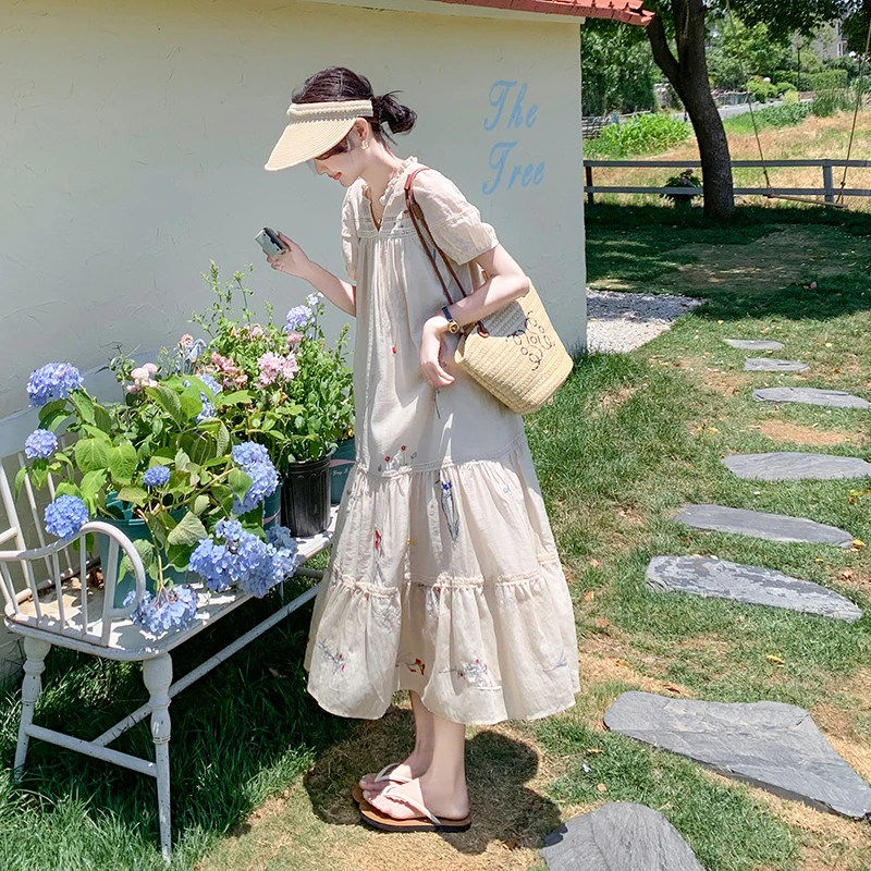 法式温柔泡泡袖连衣裙女夏2025新款度假风宽松设计感拼接仙女长裙