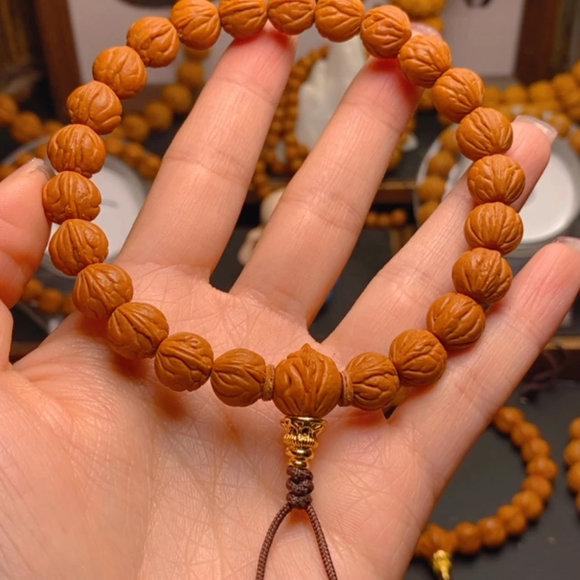 【闪购商品】桃核手串溜**达龙文桃核