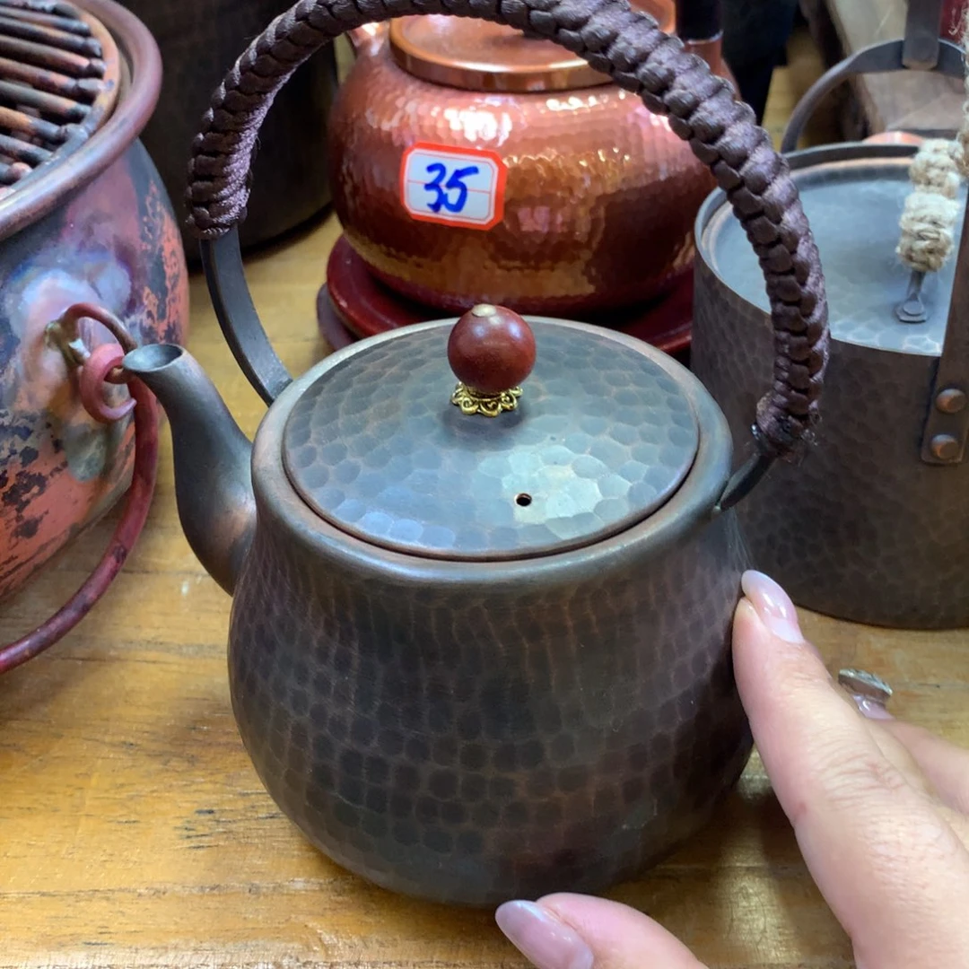 做旧锤纹提梁茶心壶