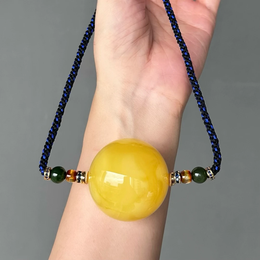 39mm蜜蜡焦皮料黄白花圆珠锁骨